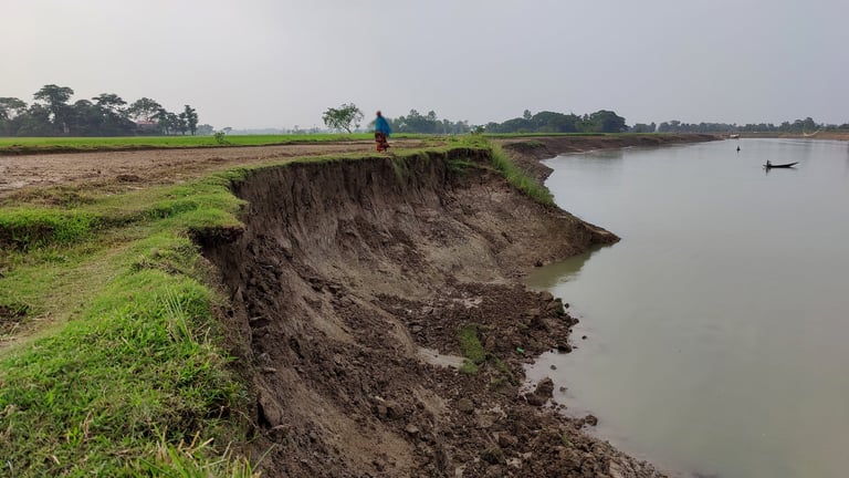 Riverbank erosion affecting coastal community landscape